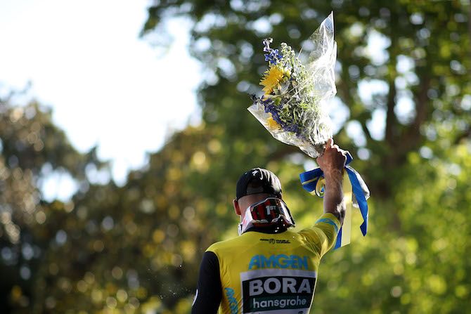 Bora-Hansgrohe's Peter Sagan holds aloft his winner's bouquet after taking the leader's jersey on the opening stage of the 2019 Tour of California