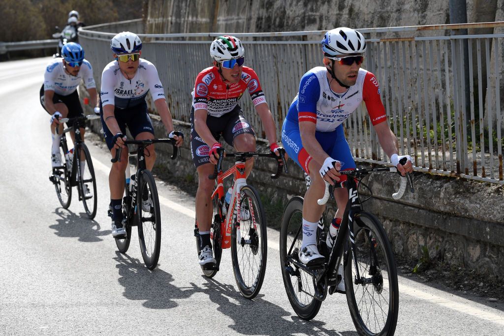 PRATI DI TIVO ITALY MARCH 13 Marco Canola of Italy and Team Gazprom Rusvelo Mads Wurtz Schmidt of Denmark and Team Israel StartUp Nation Mattia Bais of Italy and Team Androni Giocattoli Sidermec Benjamin Thomas of France and Team Groupama FDJ during the 56th TirrenoAdriatico 2021 Stage 4 a 148km stage from Terni to Prati di Tivo 1450m Breakaway TirrenoAdriatico on March 13 2021 in Prati di Tivo Italy Photo by Tim de WaeleGetty Images