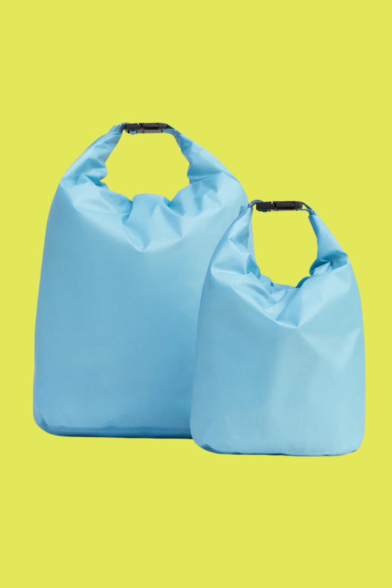 A pair of dry bags in light blue