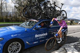 PRATI DI TIVO ITALY MARCH 13 Davide Ballerini of Italy and Team Deceuninck QuickStep Purple Sprint Jersey Davide Bramati of Italy Sports Director during the 56th TirrenoAdriatico 2021 Stage 4 a 148km stage from Terni to Prati di Tivo 1450m Car Tacx bottle Feeding TirrenoAdriatico on March 13 2021 in Prati di Tivo Italy Photo by Tim de WaeleGetty Images