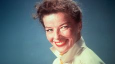 katharine hepburn on a blue background