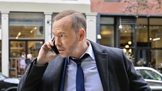 Donnie Wahlberg on the phone in Boston Blue