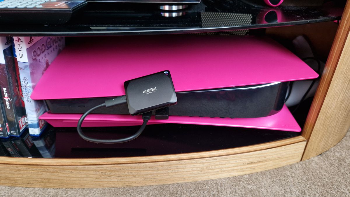 Crucial X10 Pro on top of a Pink PS5