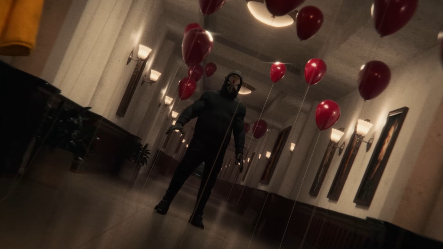 Screenshot of a man surrounded by red balloons from Muse's 'You Make Me Feel Like It's Halloween' music video