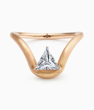 Maya Gemstones ring is an inverse star shape with a triangular diamond at the top.
