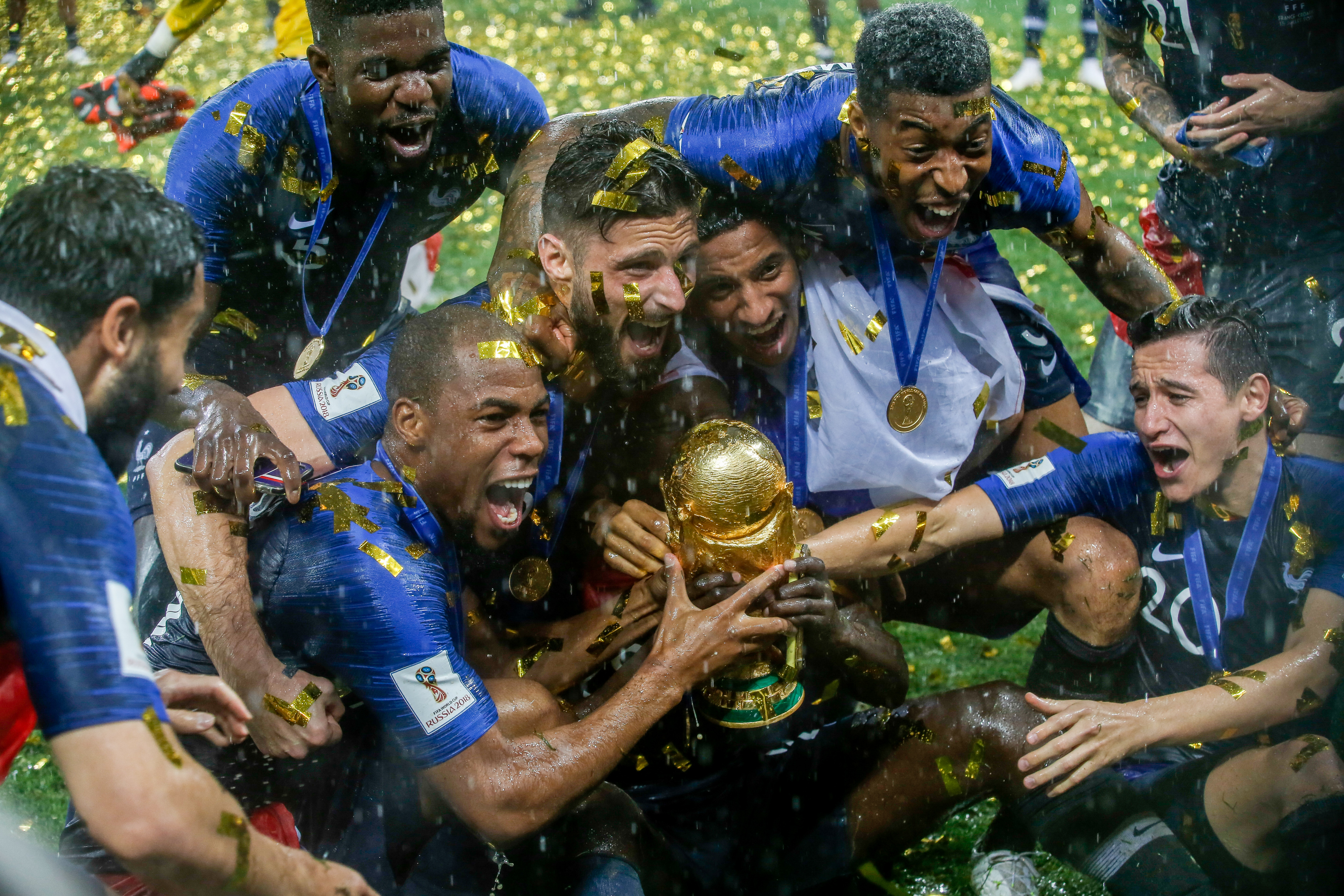 France players celebrate with the World Cup trophy after victory in the final against Croatia in July 2018.