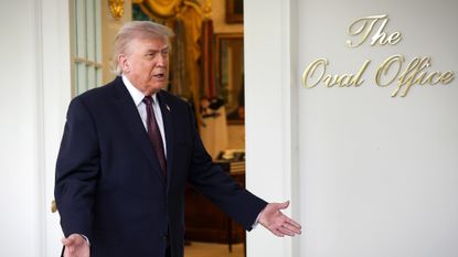 President Donald Trump talks to reporters outside the Oval Office