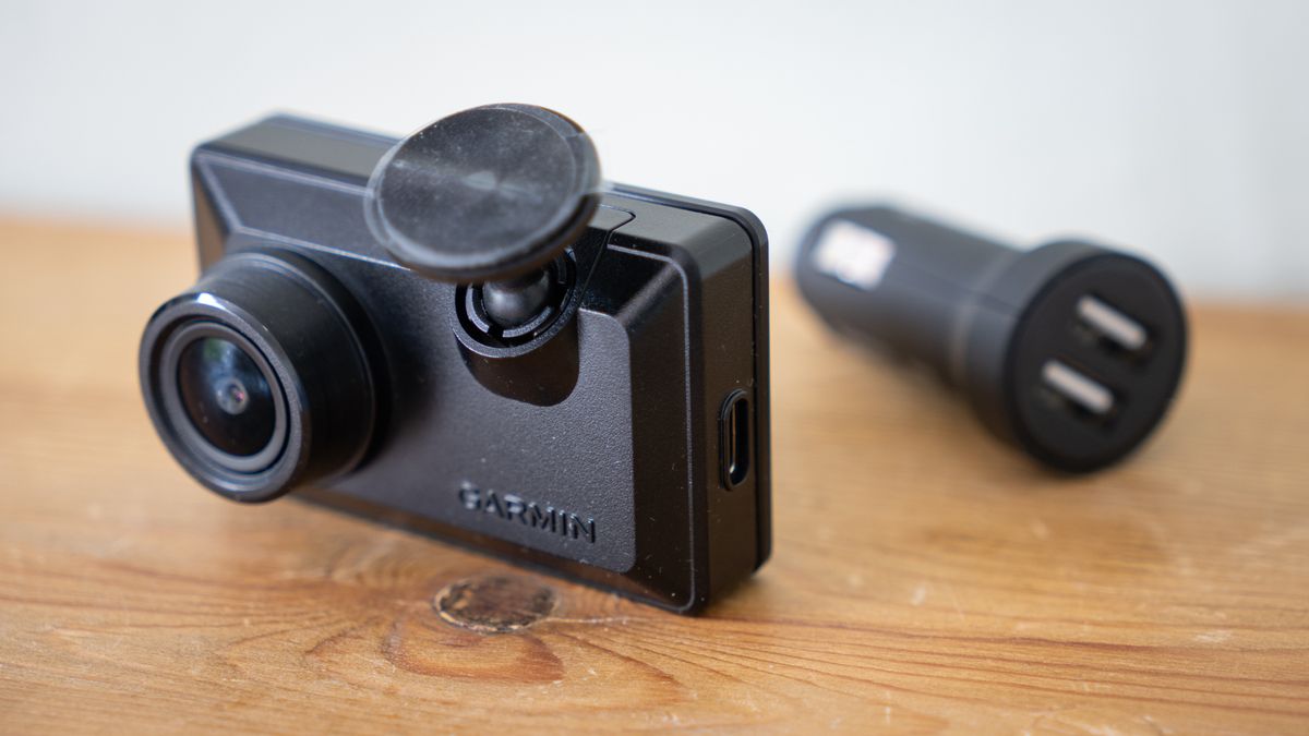 Garmin Dash Cam X110 on a wooden table