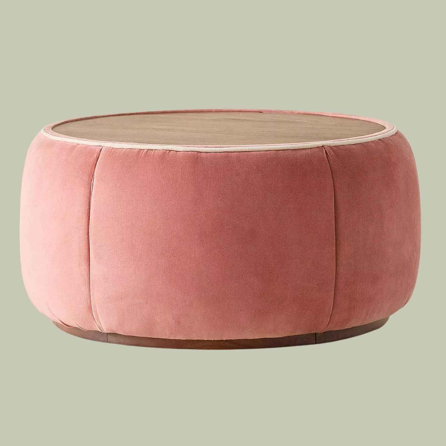 A pink storage table with a wooden lid