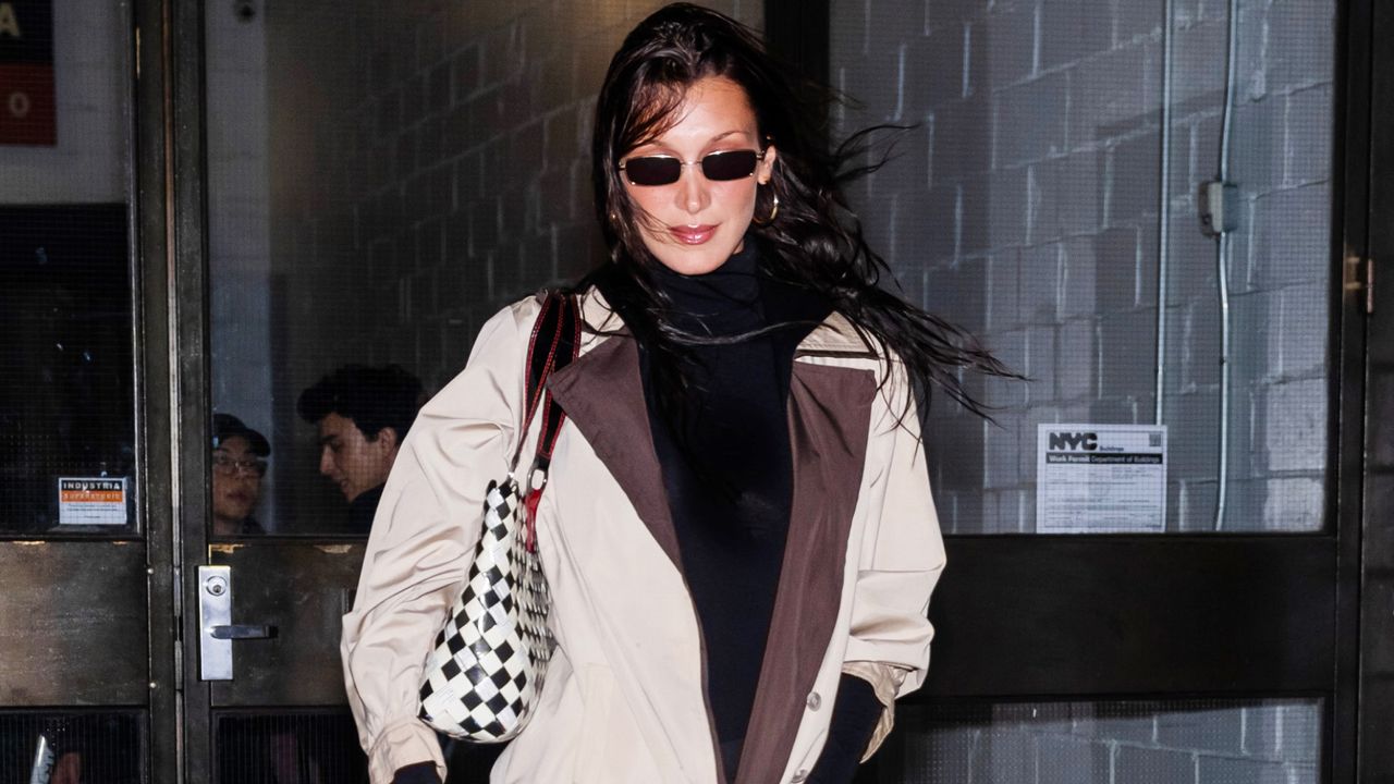 Bella Hadid made her street style comeback in a black outfit and trench coat