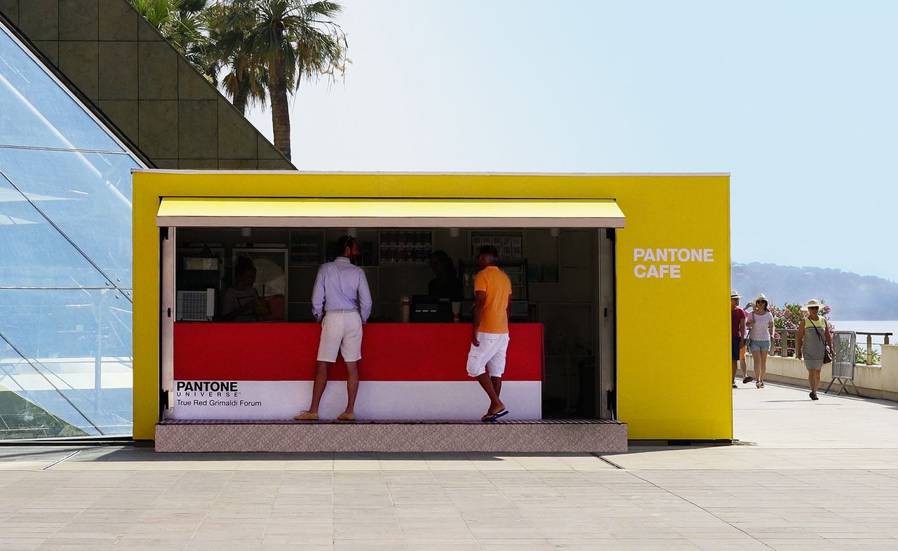 Two men waiting to grab their order