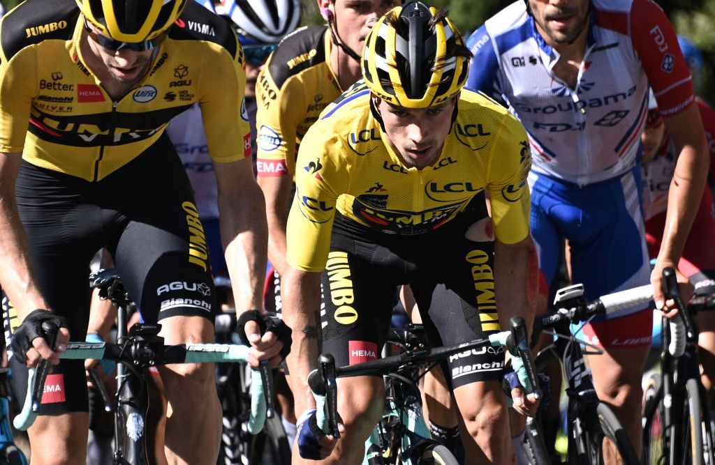 Team Jumbo rider Slovenias Primoz Roglic c wearing the overall leaders yellow jersey climb during the fourth stage of the 72nd edition of the Criterium du Dauphine cycling race 153 km between Ugine and Megeve on August 15 2020 Photo by AnneChristine POUJOULAT AFP Photo by ANNECHRISTINE POUJOULATAFP via Getty Images