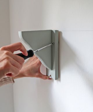 screwing in shelf brackets