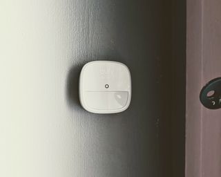eufy alarm kit motion sensor mounted to wall in writer's home
