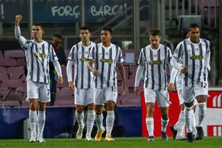Cristiano Ronaldo, left, celebrates Juventus' opener