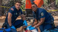 Aisha Hinds and Ryan Guzman work on a patient in 9-1-1