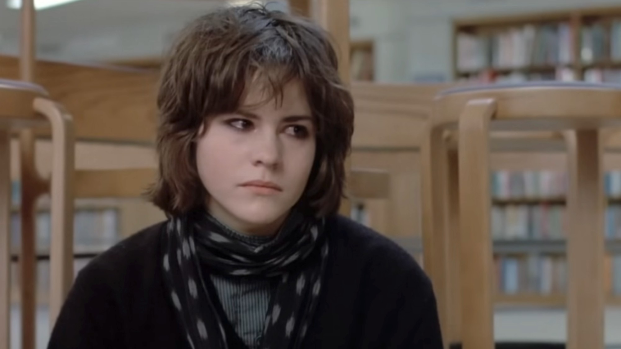 Ally Sheedy in all black, looking very serious in The Breakfast Club