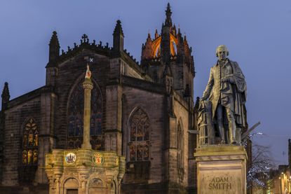 Adam Smith Monument, Gothic St Giles' Cathedral at dusk, Edinburgh, Scotland