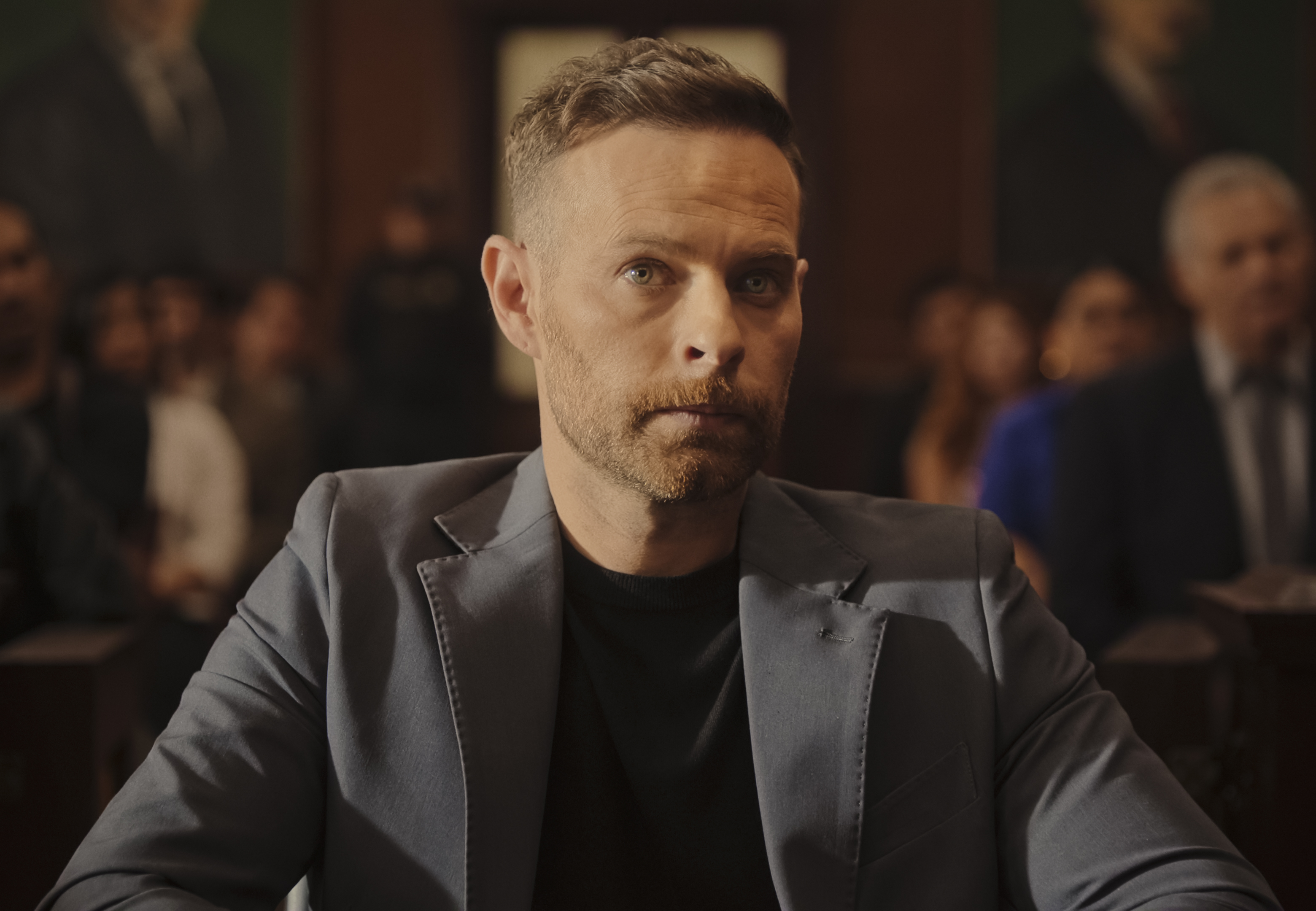 Luis Ernesto Franco as Ulises, sitting in a courtroom, in Netflix&#039;s Mexican series &#039;The Accident&#039; season 2.