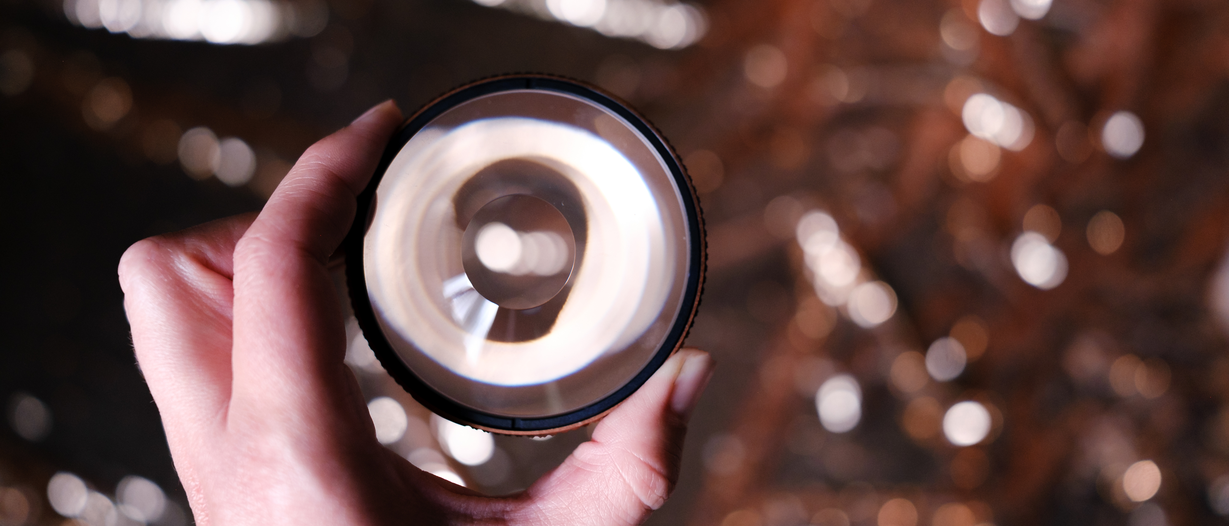The PolarPro Warp filter on a gold background