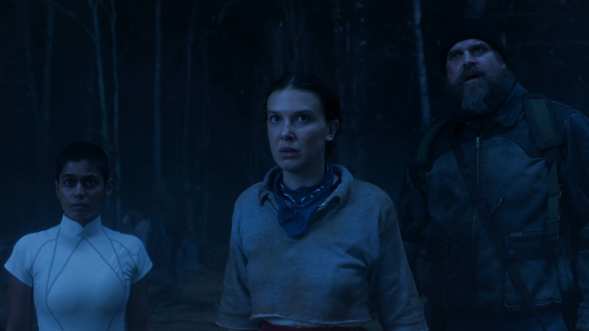 Millie Bobby Brown as Eleven, David Harbour as Hopper and Linnea Berthelsen as Kali in Stranger Things season 5 volume 2