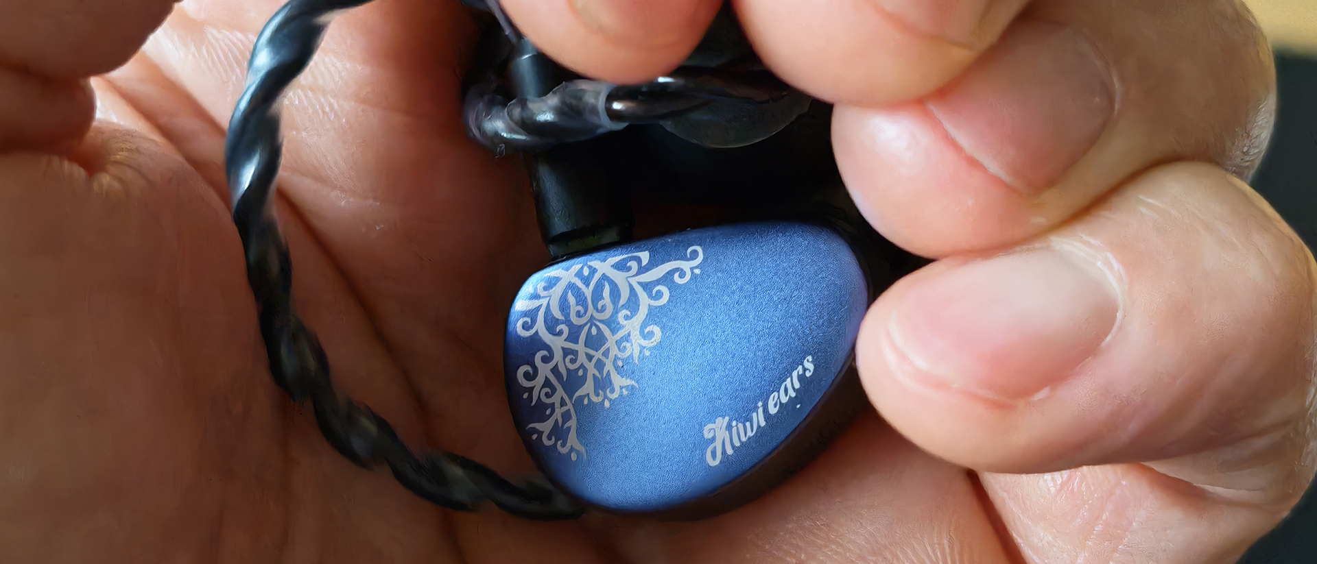 Various photos of the Kiwi Ears Cadenza II IEM. 