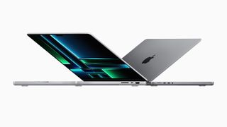 MacBook Pro 16-inch (M2 Max, 2023) product photograph showing back to back laptops half closed