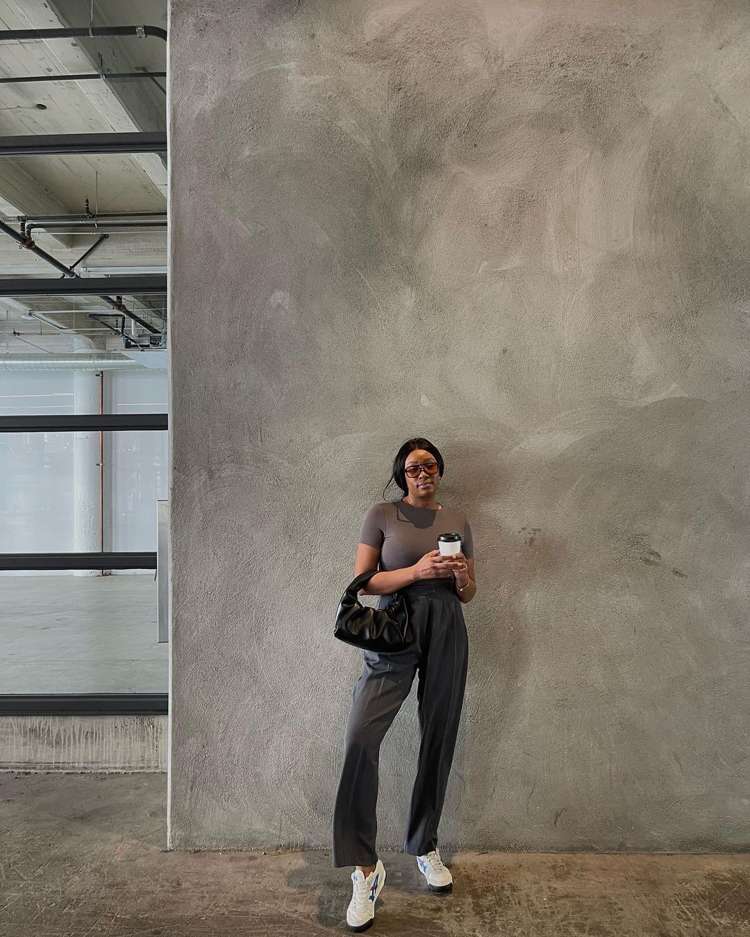 Grey trousers and trainers outfit