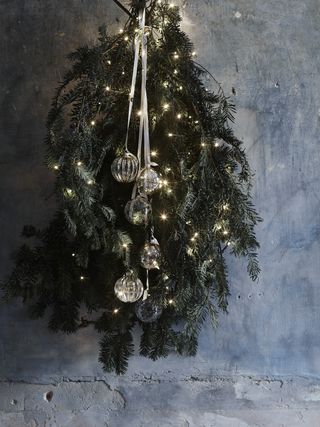Christmas New Year decorating ideas hanging foliage and baubles by Neptune