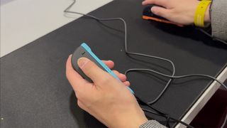 Nintendo Switch 2 mouse controls; a person uses the Switch 2 controllers as mice