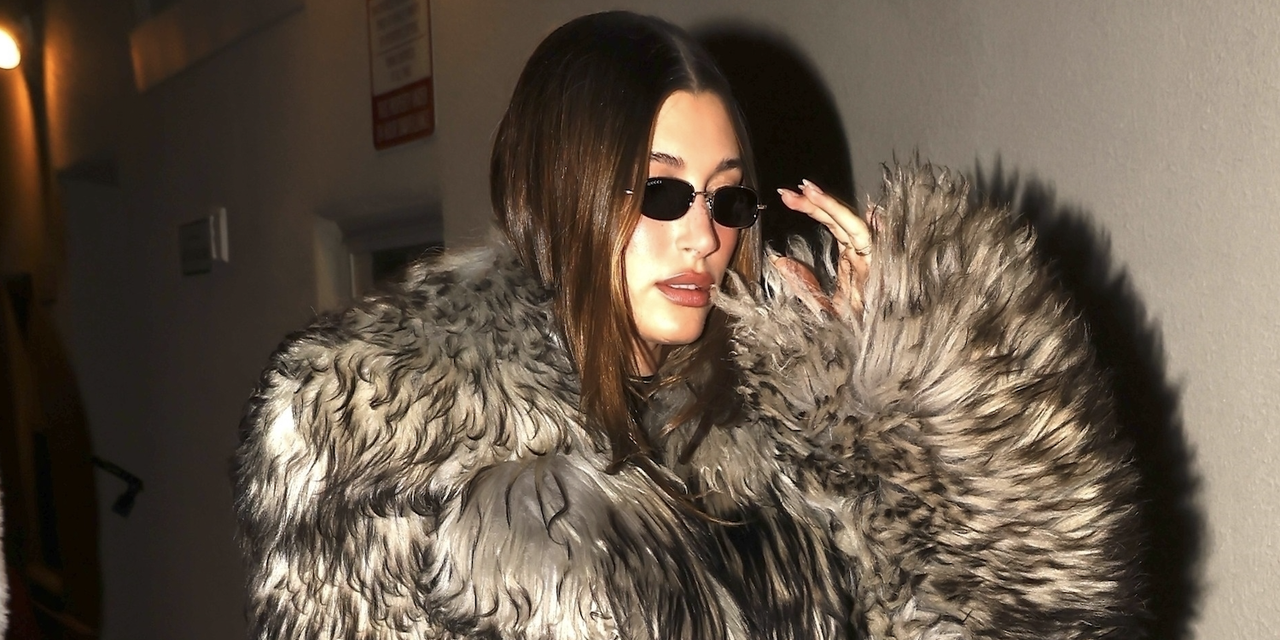 Hailey Bieber arrived at Casa Tua in Aspen in a bold gray fur coat with glossy boots and sunglasses. Kylie Jenner, with her daughter Stormi in a silver puffer, wore a sleek black fur coat, while Kendall Jenner kept it minimalist in a fitted black coat and boots. **SHOT ON 01/18/25**