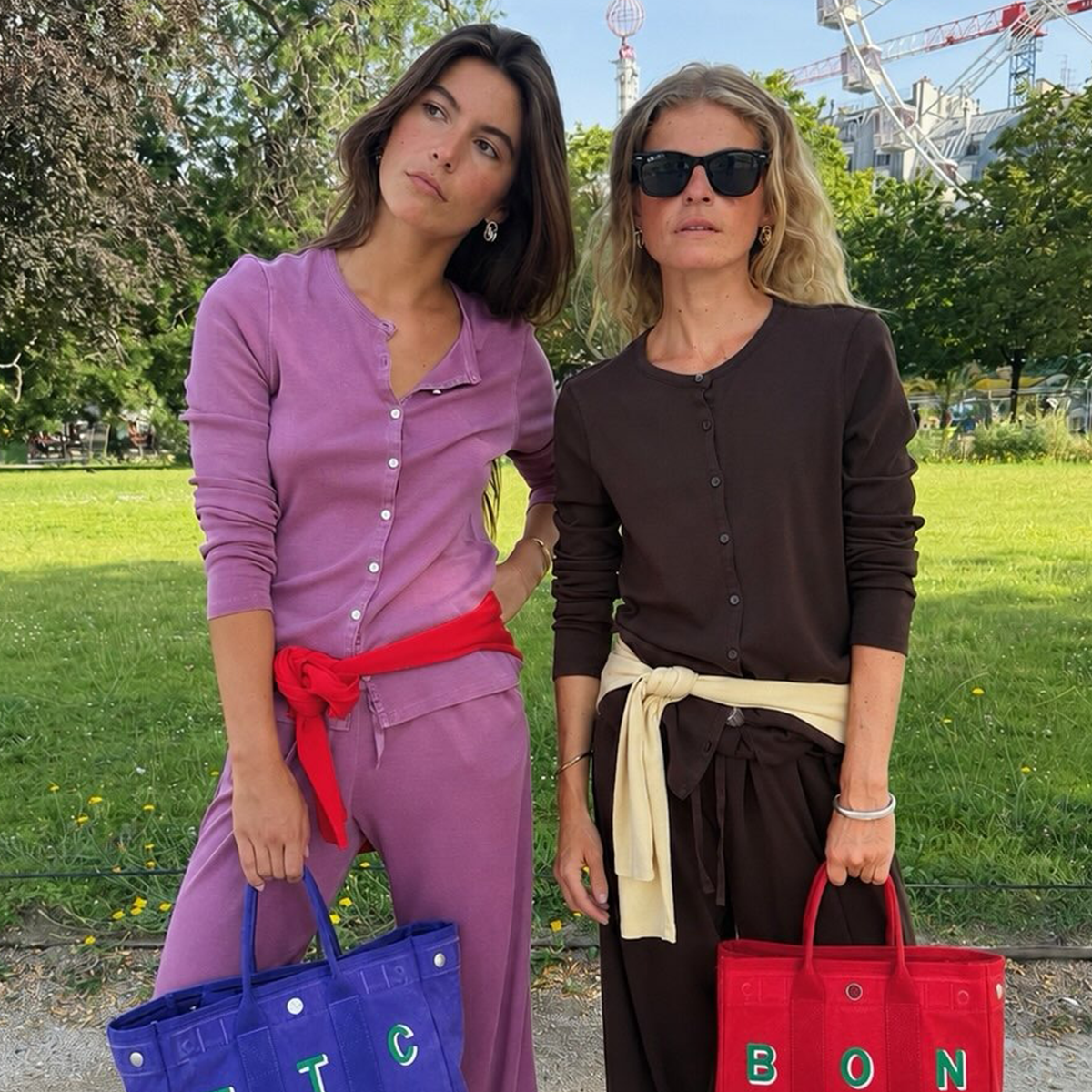 Woman wearing monogrammed canvas tote bags to Alex Mill