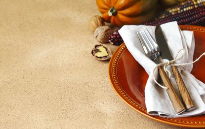 picture of decorated Thanksgiving plate and napkin on table