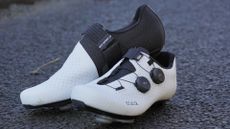 Fizik Vento Stabilita Carbon road cycling shoes pictured on tarmac