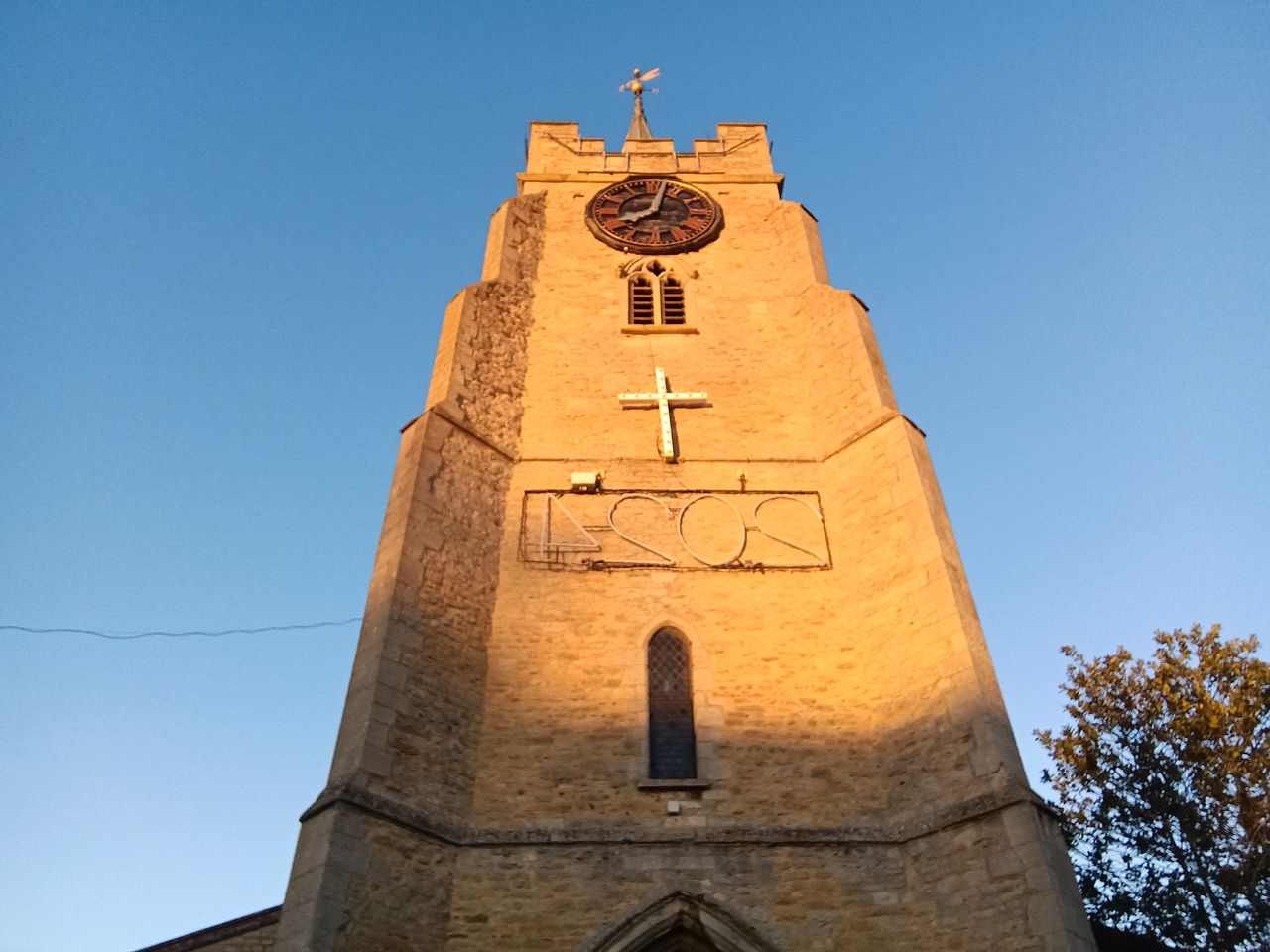 Church spire against a blue sky taken on a OnePlus Pad Go