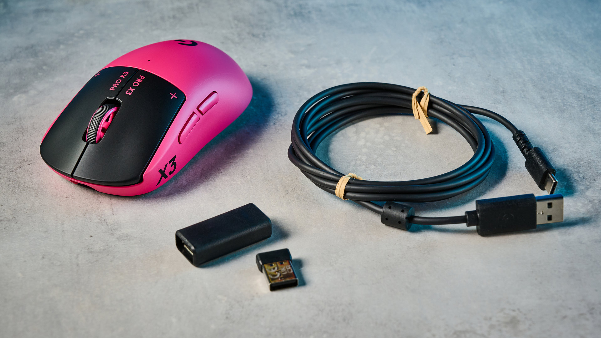 The Logitech G Pro X3 SuperStrike on a stone surface