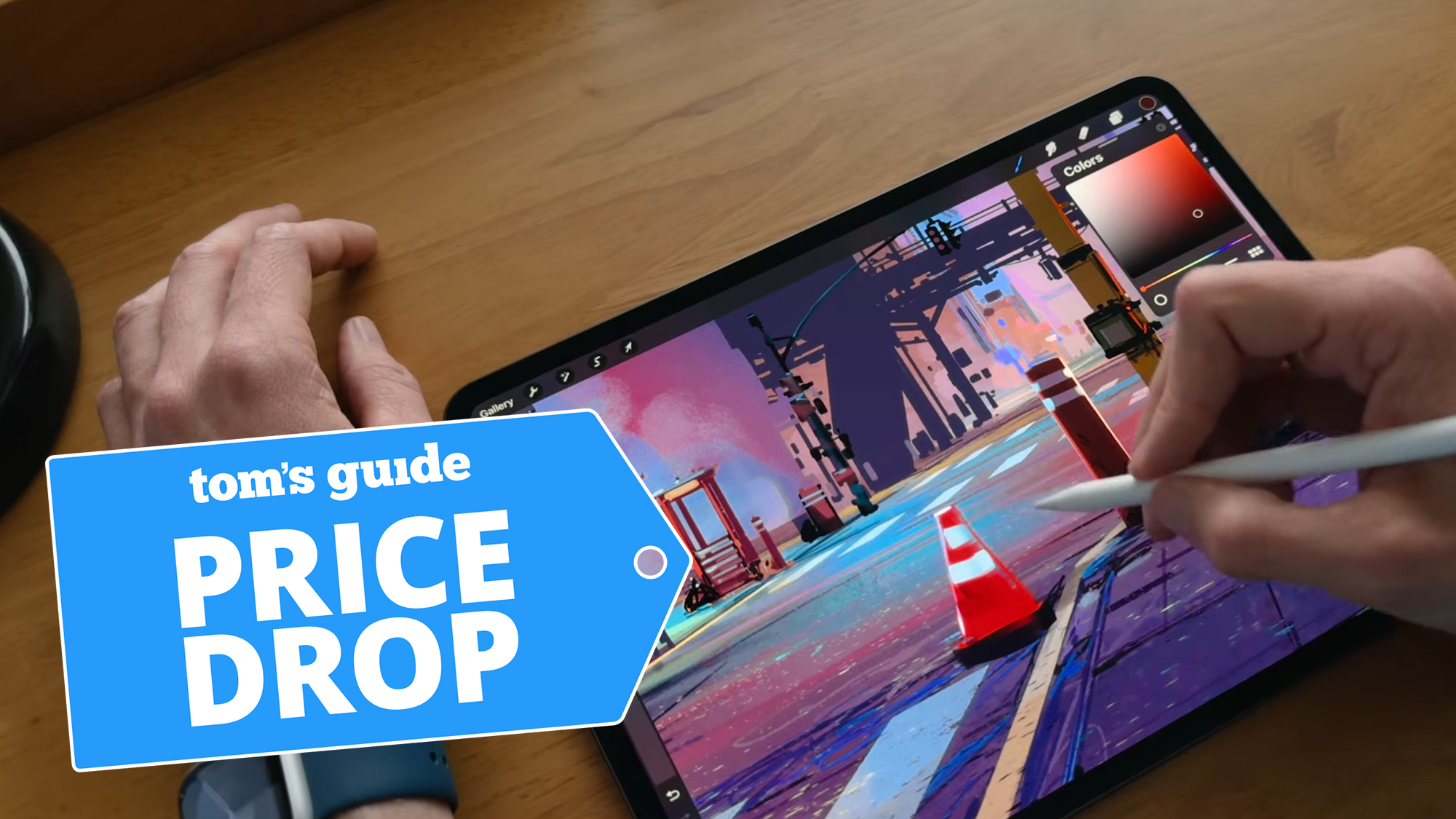 apple pencil pro being used to draw on ipad with a price drop deal tag attached