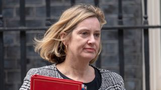 Amber Rudd, Home Secretary between 2016 and 2018, pictured walking outside No. 10
