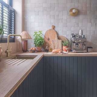 Navy kitchens with wood worktops and zellige tiles