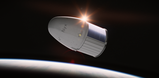 a white space capsule in orbit over Earth