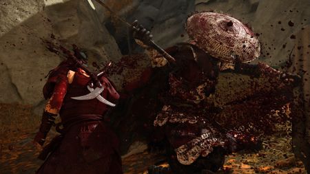 Blood splatters as Atsu slays an enemy in Ghost of Yotei with Takashi Miike mode on