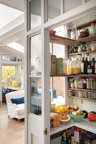 Glass pantry in open plan kitchen