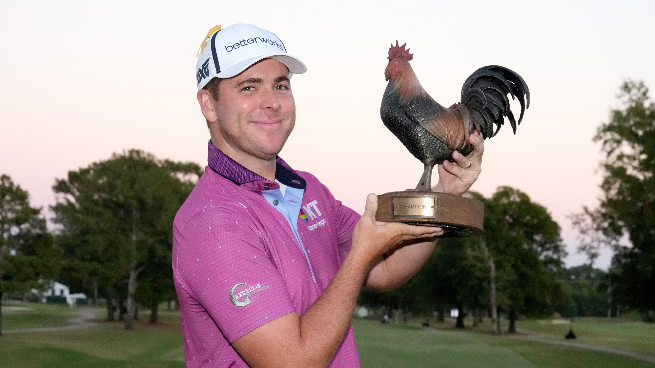 Luke List with the Sanderson Farms Championship trophy