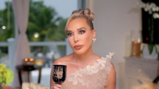 Marysol with a goblet looking annoyed in RHOM Season 7. 