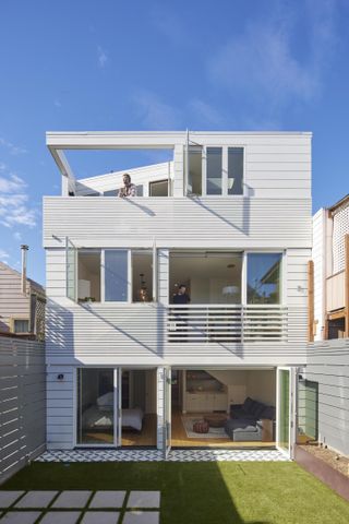 Sunny day rear exterior of The Fourth Wall house by SAW, a San Francisco bungalow transformed