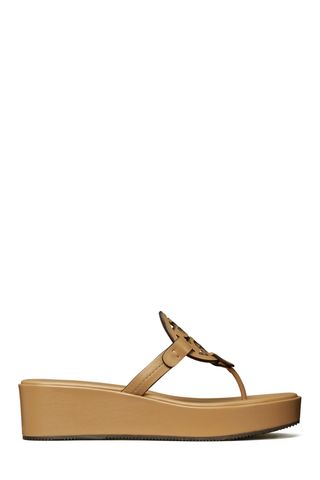 Tory Burch gold Miller Platform Wedge Thong Sandal on white background