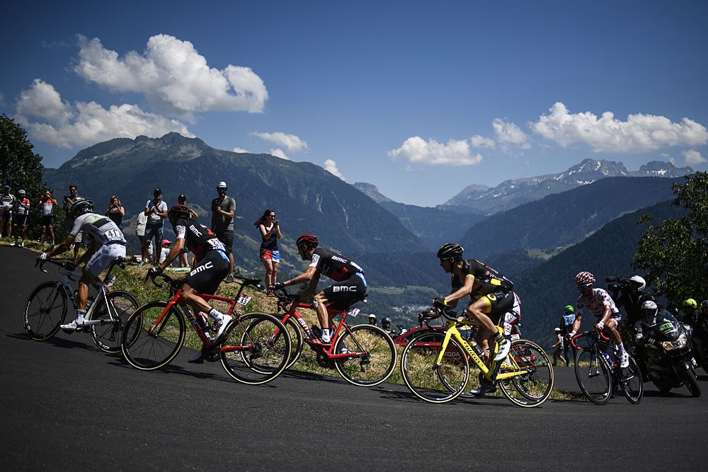 US Tejay Van Garderen, France's Romain Sicard, Spain's Daniel Navarro and France's Julian Alaphilippe, wearing the best climber's polka dot jersey, ride in the ascent of Bisanne during their breakaway
