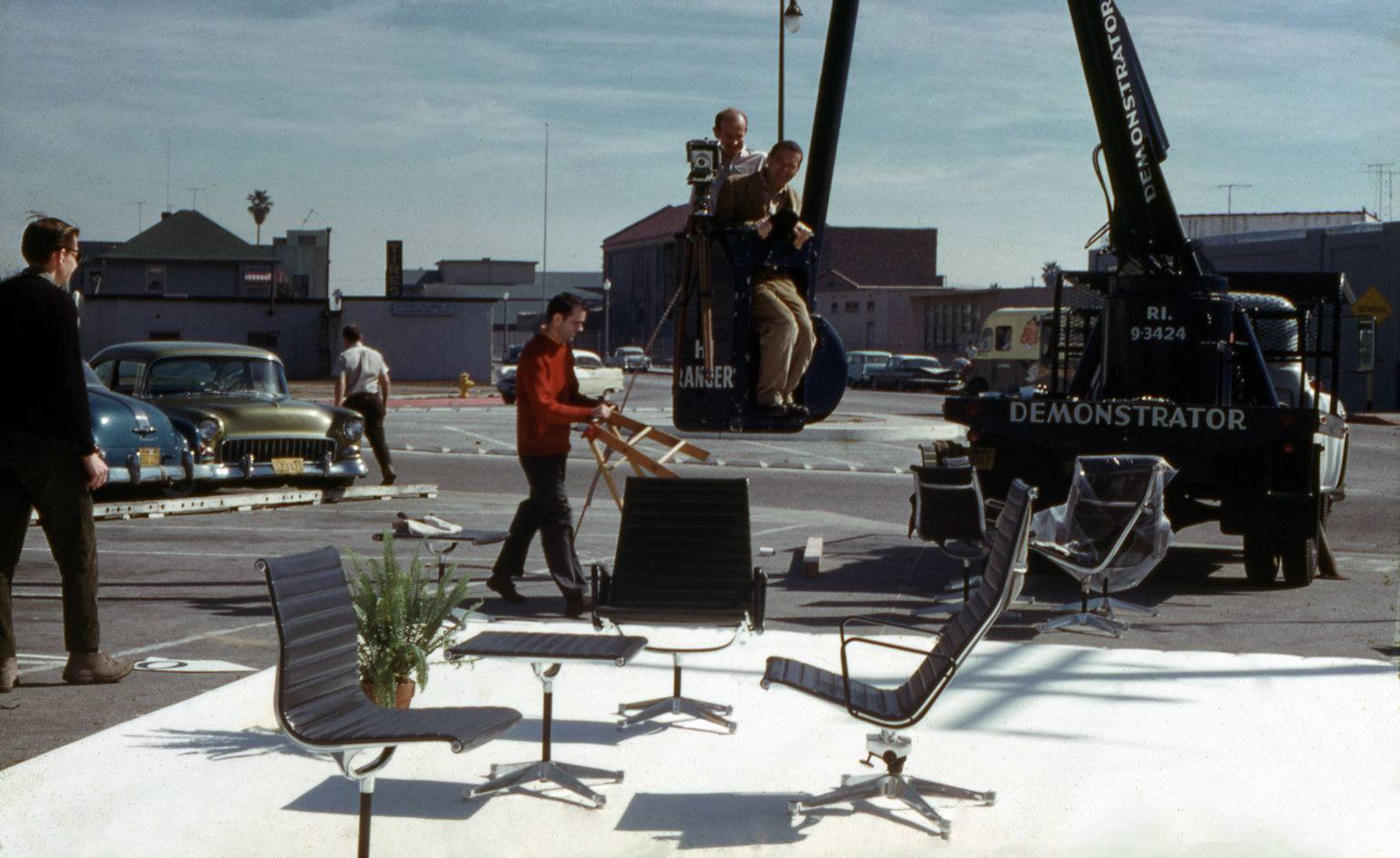Charles Eames on set, directing a photoshoot for Aluminium Group.