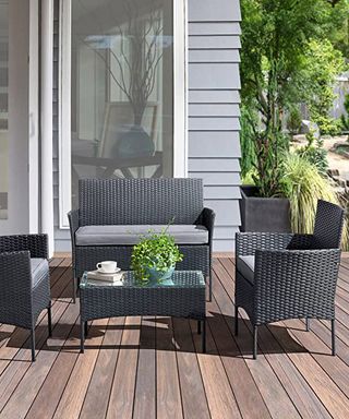 outdoor living room patio furniture on wooden decking