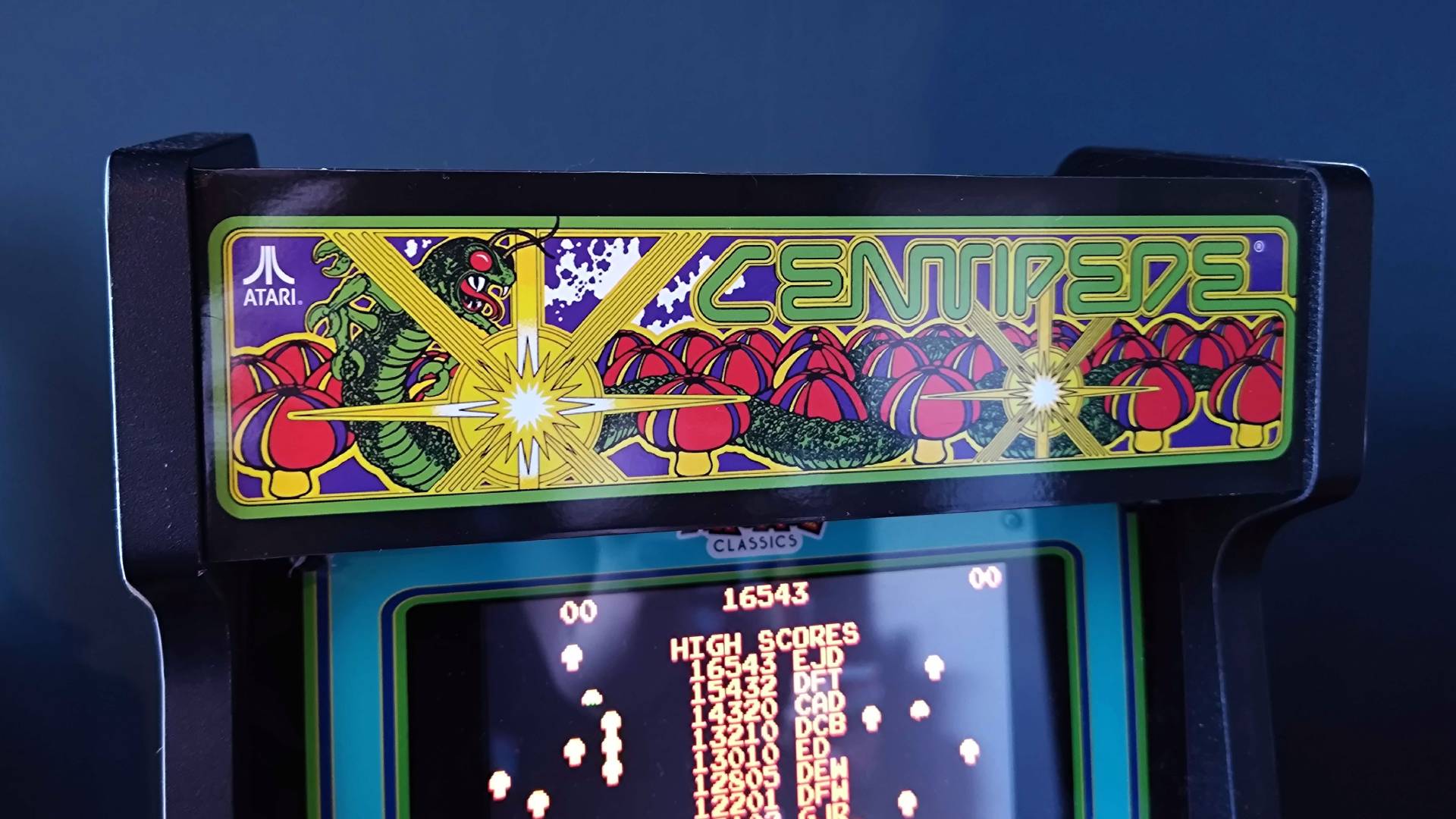 Close up of Arcade Classics Centipede  marquee sticker.